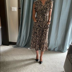 South Moon under leopard print dress.